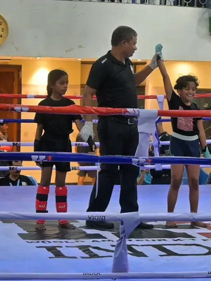 One of our young female fighters winning her kickboxing match. She shows incredible courage and skill.