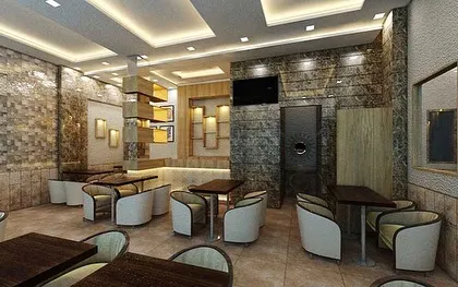 Another angle of the cafe visualization, focusing on the seating layout and the interplay of textures. The design ensures a comfortable flow for both staff and customers, maximizing the use of the 2500 sq. ft. space.