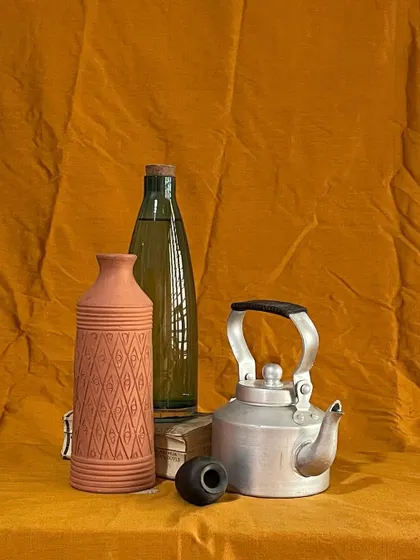 A still life arrangement prepared for a drawing class. We teach students to find beauty in everyday objects, studying their form, texture, and relationship to light and shadow.