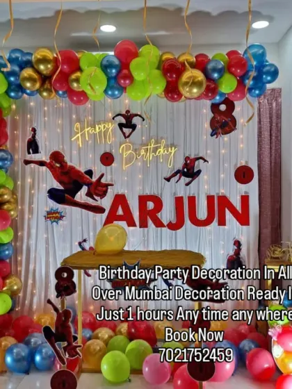 Your friendly neighborhood Spider-Man is swinging into the party. This action-packed theme features a red, blue, and gold balloon arch, multiple Spidey cutouts, and a personalized name banner for the birthday boy, Arjun.