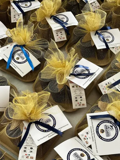 A large batch of net-wrapped gift sets for the Association of Women Entrepreneurs of Karnataka (AWAKE), highlighting our support for and collaboration with local enterprises.