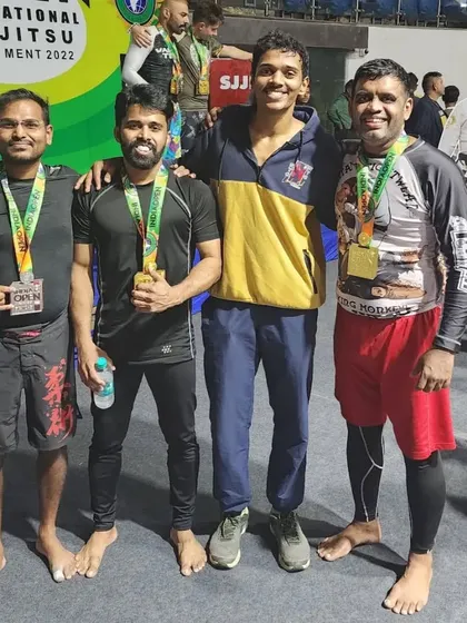 With friends at the SJJIF tournament. These events are a great place to connect with the wider BJJ community.