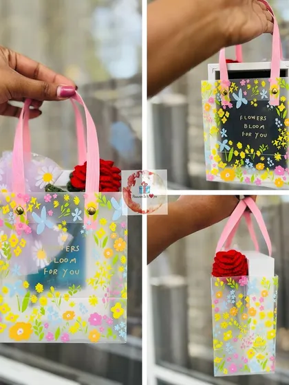 A unique and charming Valentine's gift. This transparent floral bag holds a single red rose and a small chalkboard for a personal message.