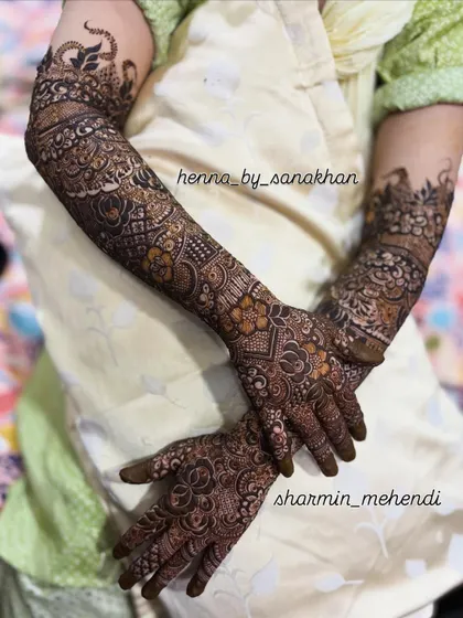 A full bridal mehndi set, showcasing the continuity of the design from the palms up to the elbows. This is a classic example of my comprehensive bridal work.