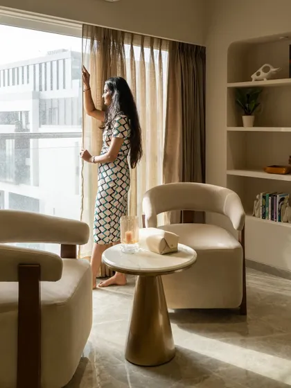 This cozy reading corner is where comfort meets quiet luxury. We blended soft neutrals, modern furniture lines, and curated accents to create a soothing space that elevates everyday living.
