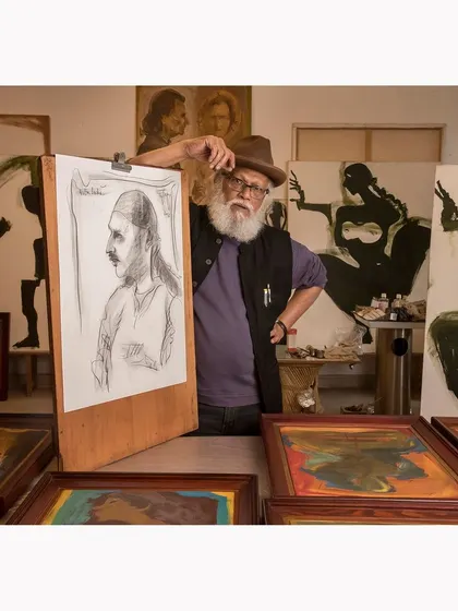 An environmental portrait of the legendary artist Jatin Das in his studio, surrounded by his work. This session highlights my approach to capturing professionals within their creative spaces, telling their story through their environment.