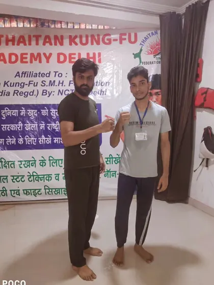 With one of my dedicated students after a training session. I am here to guide every student on their path to becoming a fighter.