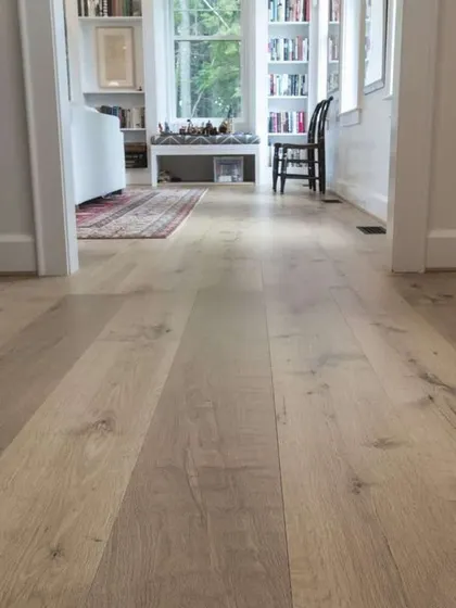 I installed this light, ash-toned wood flooring to give this space a modern, Scandinavian feel. It’s a perfect neutral base that is bright, clean, and works well with a minimalist design approach.