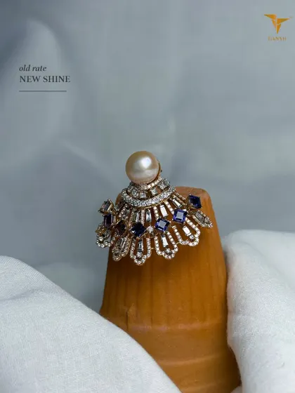When it is wedding time and everyone’s jewellery needs to be purchased, buy the best at the old rate. This stunning pearl, sapphire and diamond ring is a perfect choice.