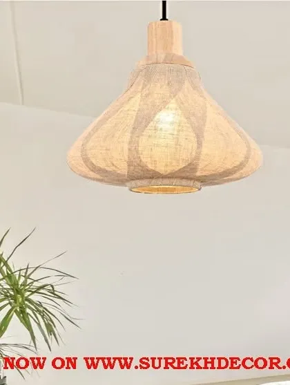 This wood-made hanging light features a unique, patterned fabric shade that casts a beautiful, diffused light. The antique wooden finish adds to its rustic and handcrafted appeal.