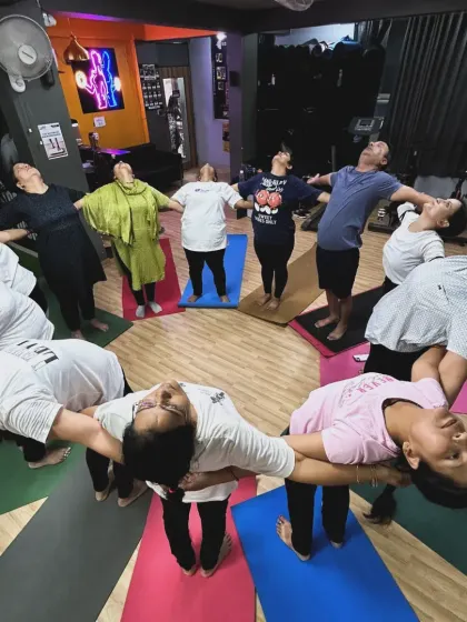 Another perspective of our group backbend circle, showing the beautiful symmetry and connection we create together.
