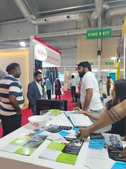 My team managing inquiries and providing brochures at our front desk. We ensure every visitor gets the information they need about our smart solutions.