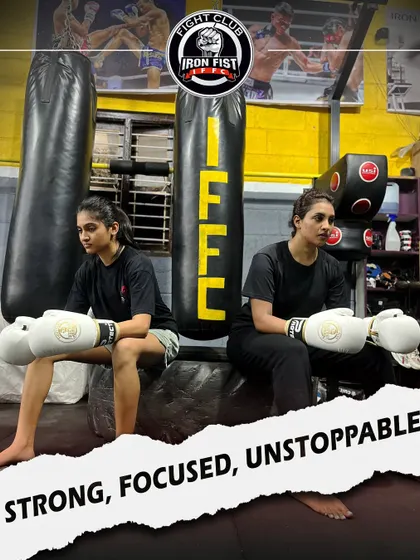 Strong, focused, and unstoppable. Two of our female members taking a break between rounds, embodying the spirit and resilience we cultivate at the club.