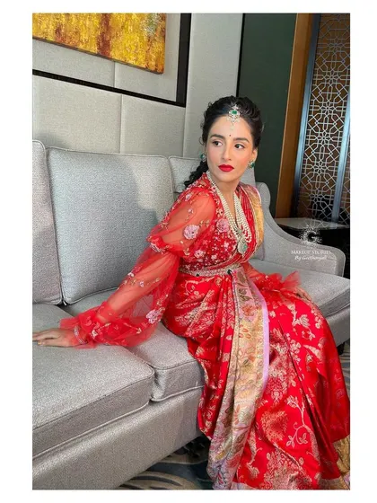 This image is a duplicate of 169, showing Krishna's full fusion look. The makeup is glamorous and polished, ensuring she looks stunning from head to toe.