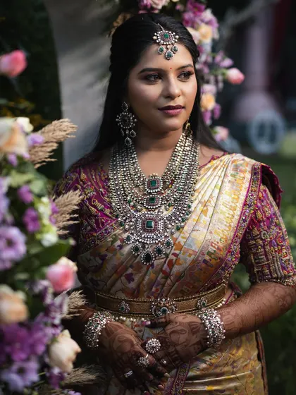 The same bride, her regal presence and stunning jewelry making for a powerful portrait.