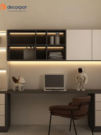 A sleek and modern study area with a dark grey and white theme. The overhead shelving with backlighting provides ample storage and a sophisticated look, perfect for a home office or teen's room.