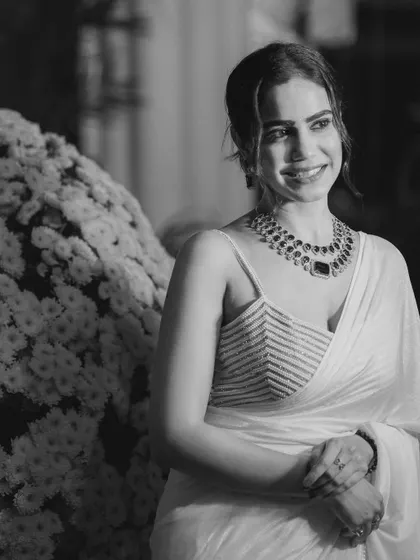 A classic black and white portrait that adds a timeless feel to the shoot at Radisson Blu, Goa.