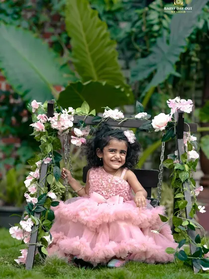 Every little girl is a princess. We captured this beautiful smile on our floral swing in the garden, creating a perfect fairytale moment.
