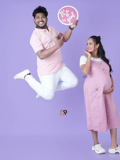 It's a girl! The dad-to-be jumps for joy in this fun and energetic gender reveal photo. We have a variety of signs and props to help you share your exciting news.