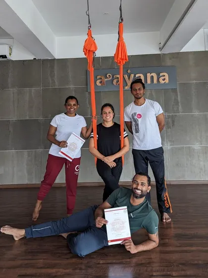 A group photo of our newly certified aerial yoga teachers with their instructor.