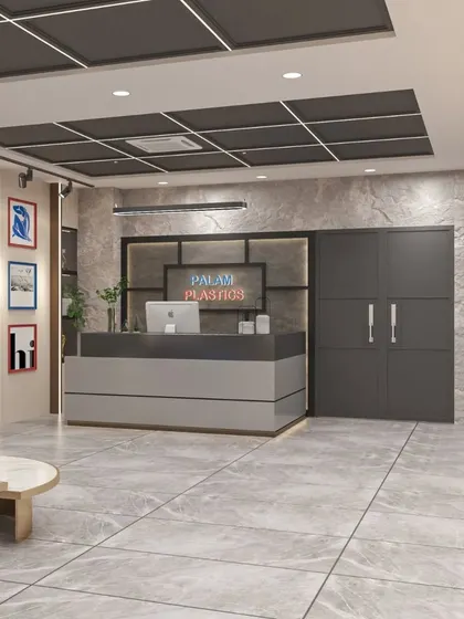 A sleek reception desk against a textured stone wall, designed to give a modern and professional welcome to visitors.