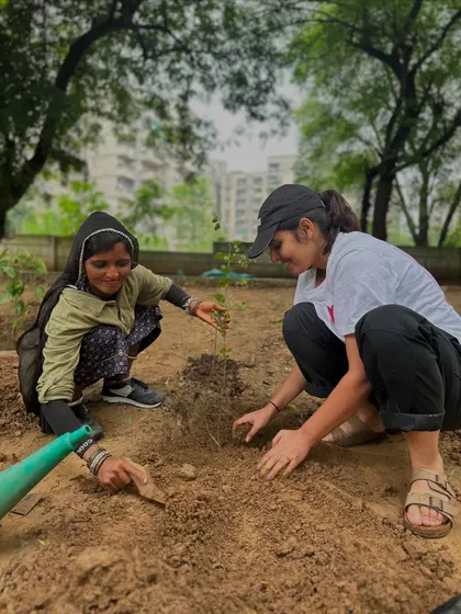 A volunteer from Calpro works alongside one of our experienced on-ground team members, a perfect example of community and expertise coming together.