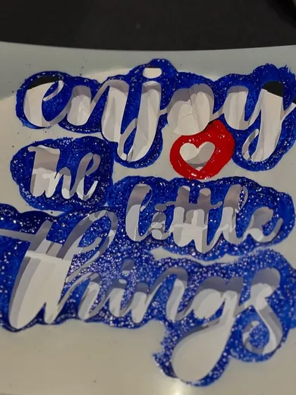 A stencil that says "enjoy the little things" used during a tote bag workshop. It's a perfect reminder of what my art parties are all about.