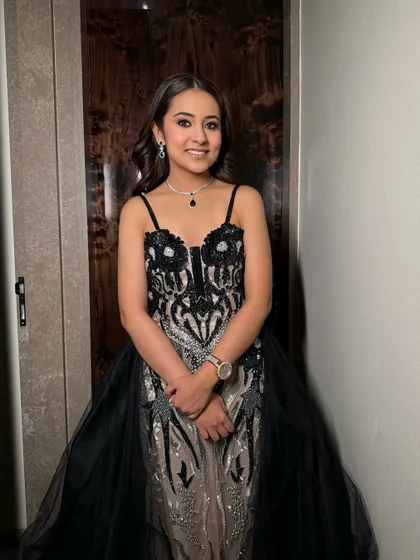 Cocktail ready in a gorgeous black gown. I created a sophisticated glam look with defined eyes and luminous skin to ensure she looked and felt her best for the party.