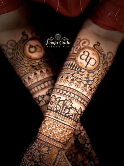 Mark your engagement with a design that's uniquely yours. This piece features the couple's initials "AP" in a beautiful monogram, surrounded by intricate peacock motifs and traditional patterns, symbolizing a new beginning.