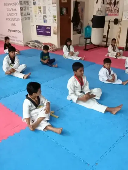 The 5 pm batch at our Chellikere dojang taking a short break.