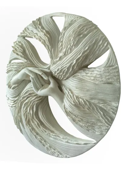 An angled view of 'The Awakening Cycle series 2,' highlighting the three-dimensional quality of the upcycled paper sculpture and the delicate interaction between the hands.