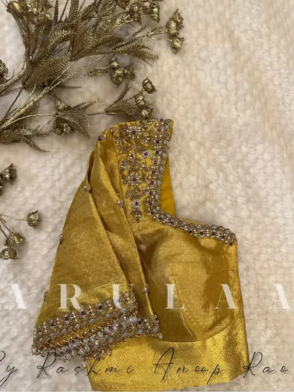 A close-up of the mustard yellow blouse, highlighting the intricate kundan work. I used dull-toned kundans to complement the silver and gold zari in the saree.