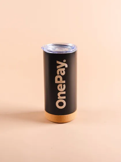 A close-up of the custom-branded tumbler for OnePay. High-quality, useful items like this are always a hit in employee welcome kits and get used daily.