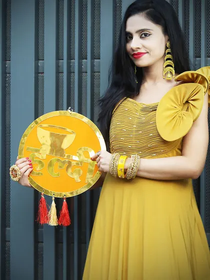 A close-up of the Haldi gown, showing the delicate embroidery on the bodice.