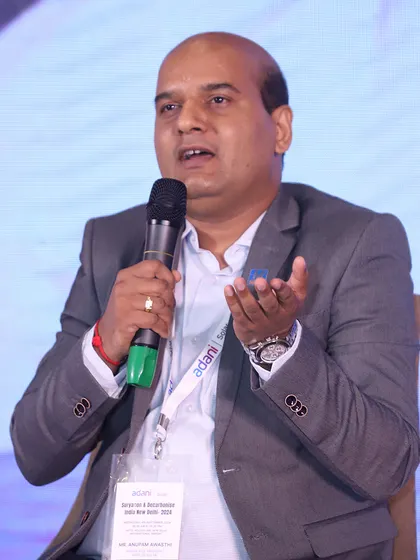 Anupam Awasthi speaking on the need for all stakeholders, including developers, manufacturers, and government, to address challenges to uniform policy implementation across states.