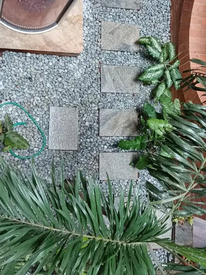 An overhead view of a pebble and stone pathway we created. This design is perfect for adding a Zen garden feel to a small courtyard.