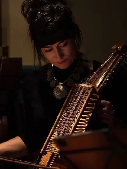 A musician plays the Nyckelharpa, a traditional Swedish instrument. Its inclusion in 'Sangam' is a perfect example of how we bring rare and beautiful sounds from different cultures together.