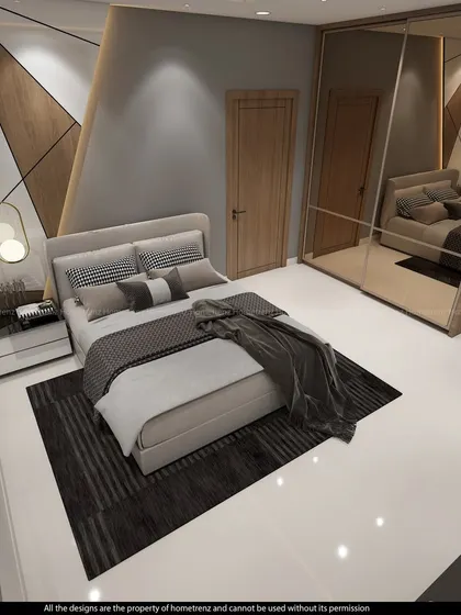 Another angle of the guest bedroom, showing the bed and the interesting play of angles on the feature wall.