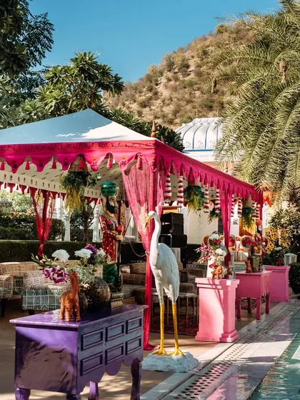 Quirky decor elements like a flamingo statue and colorful furniture added a contemporary twist to the traditional Jaipur Haldi.