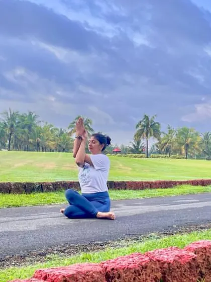 Practicing Garudasana (Eagle Pose) arms in a seated position. Yoga begins with listening and giving space to what is.
