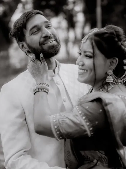 Sometimes, a moment is best captured in black and white. This removes all distractions and focuses purely on the joy and laughter shared between the couple, creating a truly timeless and emotional photograph.