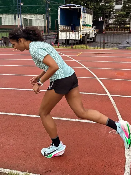 Driving forward during a speed session on the track. My structured workouts are designed to push your limits and build the speed you need for race day.