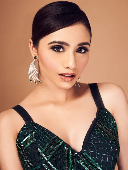 Love me a pop of color! This emerald eye look is for the client who isn't afraid to be bold. I balanced the dramatic, jewel-toned smokey eye with a clean base and a neutral lip to keep it chic and sophisticated.
