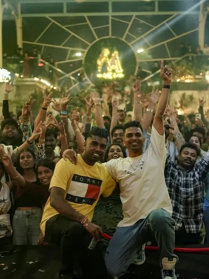 It's not just my show, it's our party. Jumping in for a photo with the crowd at Macaw, capturing the collective energy and making a memory with the people who make it all happen.