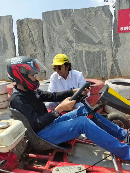 One on one coaching is a core part of our training philosophy. We take the time to sit with each new driver, explaining the controls and ensuring they feel secure before their first session on the track.
