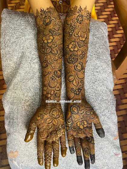 This design features a unique pattern on the palms with a focus on bold, central motifs.