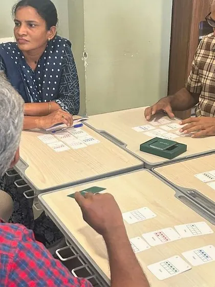Another group of teachers at CS Academy playing Yonjuu. The game sparks strategic thinking and lively discussion, key elements of an effective professional development session.