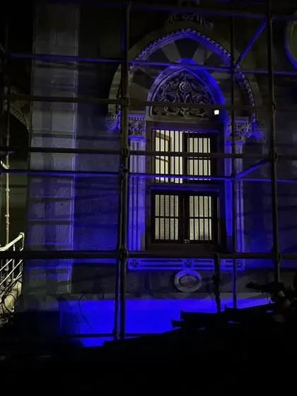 A test of the dynamic color capabilities. The powerful blue light demonstrates how the building's mood can be completely transformed for festivals and public events, adding a modern, vibrant dimension to the historic structure.