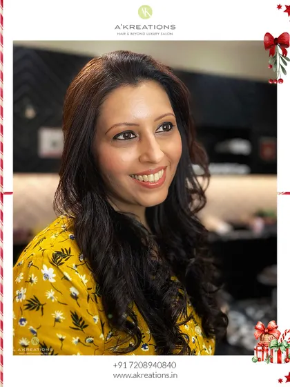 A bright smile from our client, showcasing her beautiful and festive Christmas glam, perfect for any holiday party.