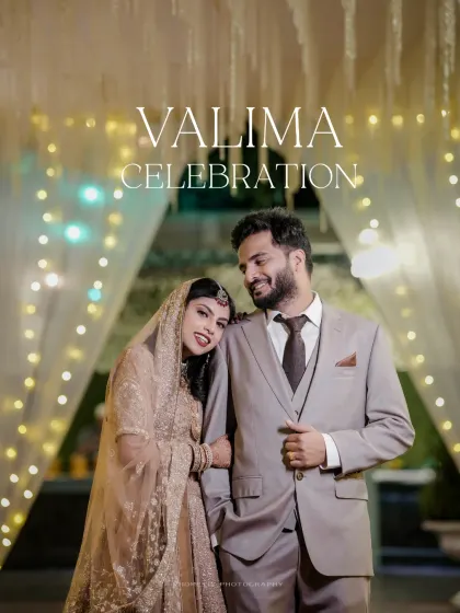 A romantic portrait of the couple at their 'Valima Celebration', framed by soft lights for a dreamy effect.